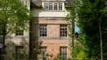 First-time buyer couple in Islington reviewing mortgage options with adviser