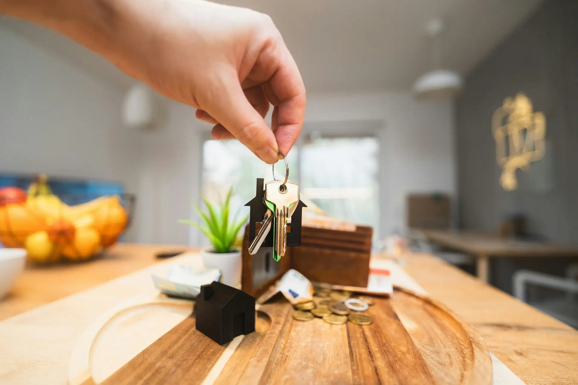 Camden townhouse street with landlord reviewing buy-to-let figures